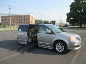 Silver Dodge Grand Caravan with BraunAbility Side Entry Automatic Fold Out conversion
