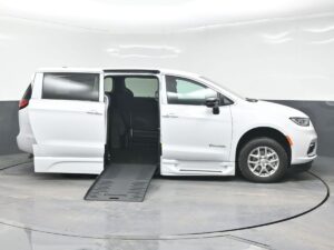White Chrysler Pacifica with BraunAbility Side Entry Automatic Fold Out conversion