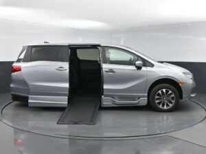 Silver Honda Odyssey with BraunAbility Side Entry Automatic In Floor conversion