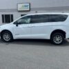 White Chrysler Voyager with BraunAbility Rear Entry Manual Fold Out conversion