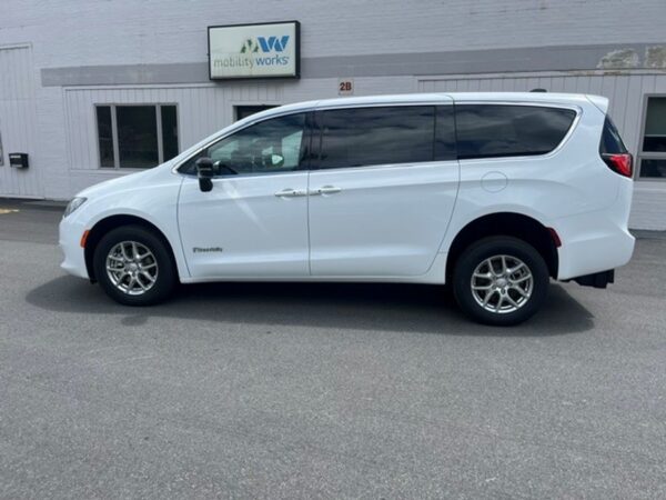 White Chrysler Voyager with BraunAbility Rear Entry Manual Fold Out conversion
