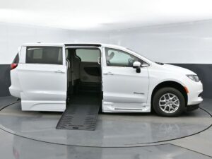 White Chrysler Voyager with BraunAbility Side Entry Automatic Fold Out conversion