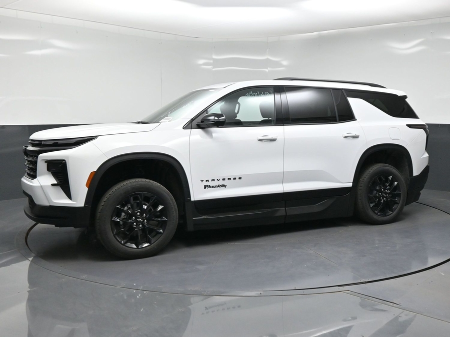 White Chevrolet Traverse with BraunAbility Side Entry Automatic In Floor conversion