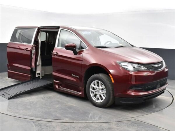Red Chrysler Voyager with BraunAbility Side Entry Automatic Fold Out conversion