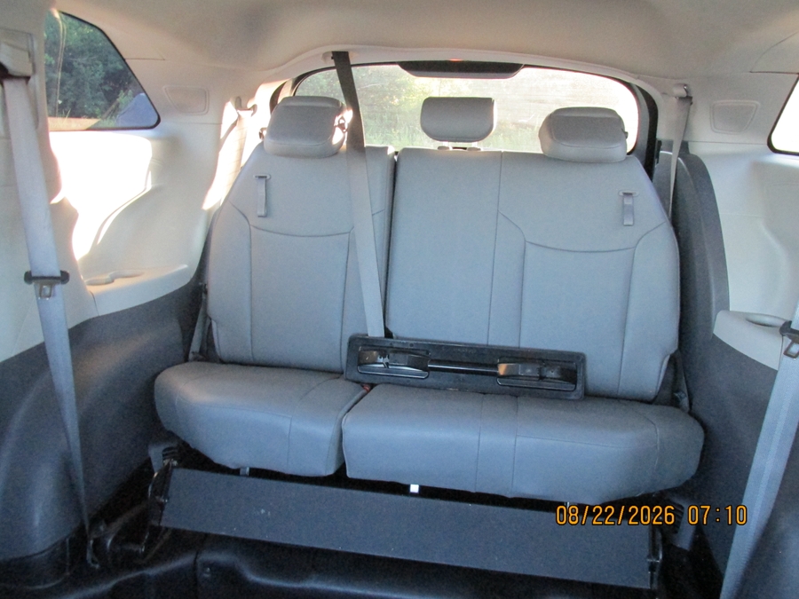 Silver Toyota Sienna with BraunAbility Side Entry Automatic Fold Out conversion