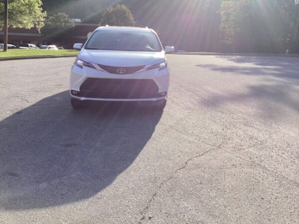 White Toyota Sienna with BraunAbility Side Entry Automatic In Floor conversion