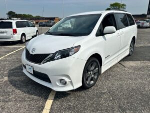 White Toyota Sienna with BraunAbility Side Entry Automatic Fold Out conversion