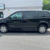 Black Dodge Grand Caravan with BraunAbility Side Entry Automatic Fold Out conversion