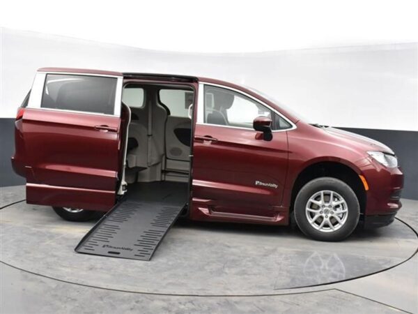 Red Chrysler Voyager with BraunAbility Side Entry Automatic Fold Out conversion