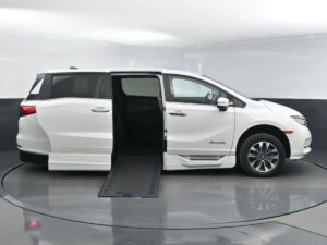 White Honda Odyssey with BraunAbility Side Entry Automatic In Floor conversion