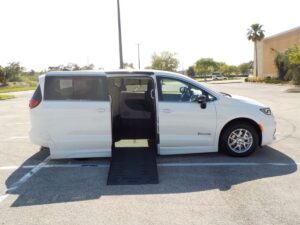 White Chrysler Pacifica with BraunAbility Side Entry Automatic Fold Out conversion