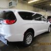 White Chrysler Voyager with BraunAbility Rear Entry Manual Fold Out conversion