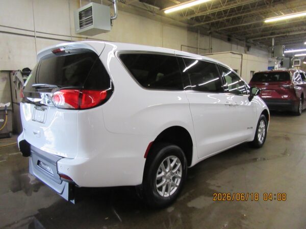 White Chrysler Voyager with BraunAbility Rear Entry Manual Fold Out conversion