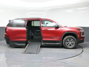 Red Chevrolet Traverse with BraunAbility Side Entry Automatic In Floor conversion