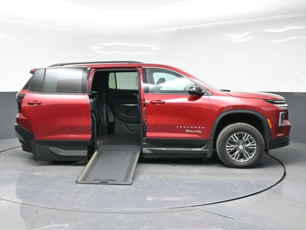 Red Chevrolet Traverse with BraunAbility Side Entry Automatic In Floor conversion