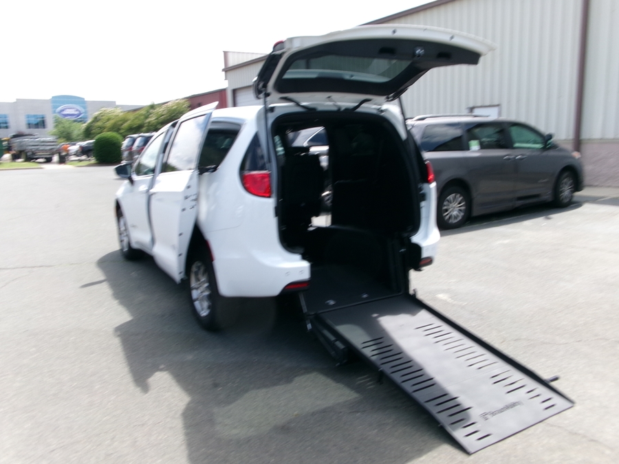 White Chrysler Voyager with BraunAbility Rear Entry Manual Fold Out conversion