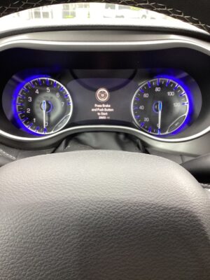 White Chrysler Pacifica with BraunAbility Side Entry Automatic Fold Out conversion