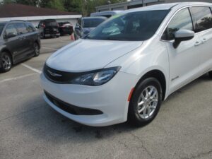 White Chrysler Voyager with BraunAbility Rear Entry Manual Fold Out conversion