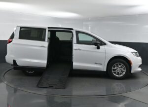 White Chrysler Voyager with BraunAbility Side Entry Manual Fold Out conversion