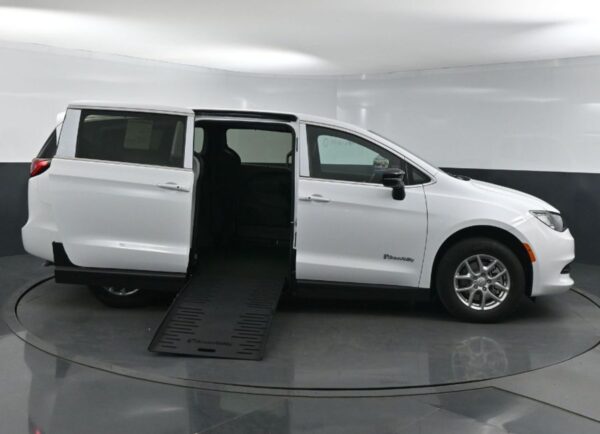 White Chrysler Voyager with BraunAbility Side Entry Manual Fold Out conversion