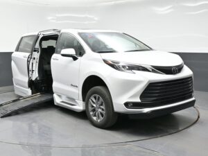White Toyota Sienna with BraunAbility Side Entry Automatic Fold Out conversion
