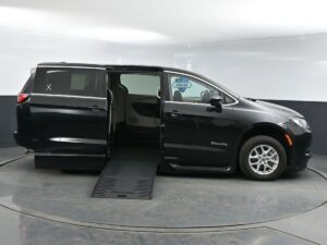Black Chrysler Voyager with BraunAbility Side Entry Automatic Fold Out conversion
