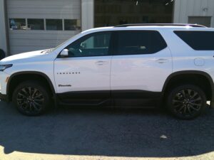 White Chevrolet Traverse with BraunAbility Side Entry Automatic In Floor conversion