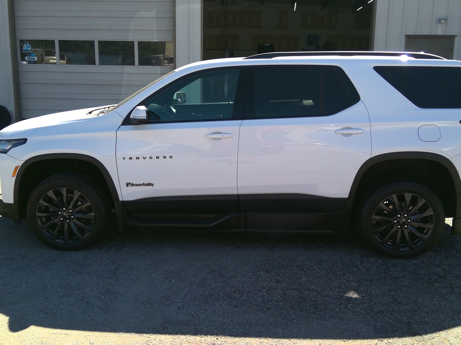 White Chevrolet Traverse with BraunAbility Side Entry Automatic In Floor conversion