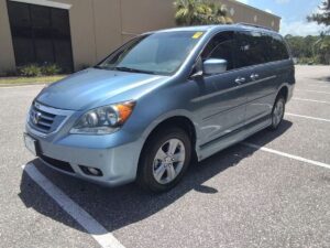 Blue Honda Odyssey with Vantage Mobility Side Entry Automatic Fold Out conversion