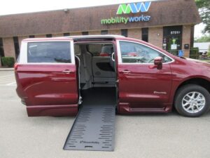 Red Chrysler Pacifica with BraunAbility Side Entry Automatic Fold Out conversion