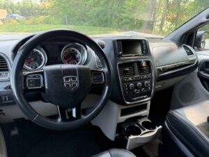White Dodge Grand Caravan with Vantage Mobility Side Entry Automatic In Floor conversion