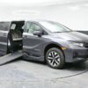 Grey Honda Odyssey with BraunAbility Side Entry Automatic In Floor conversion