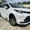 White Toyota Sienna with BraunAbility Side Entry Automatic Fold Out conversion