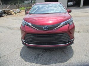 Red Toyota Sienna with BraunAbility Side Entry Automatic Fold Out conversion