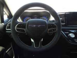 White Chrysler Voyager with FR Conversions Rear Entry Manual Fold Out conversion