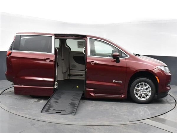 Red Chrysler Voyager with BraunAbility Side Entry Automatic Fold Out conversion
