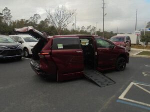 Red Toyota Sienna with BraunAbility Side Entry Automatic Fold Out conversion