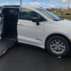 White Chrysler Voyager with Driverge Side Entry Automatic Fold Out conversion