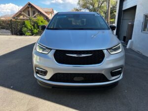 Silver Chrysler Pacifica with BraunAbility Side Entry Automatic In Floor conversion