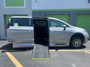 Silver Chrysler Pacifica with Driverge Side Entry Automatic Fold Out conversion