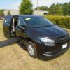 Black Chrysler Voyager with BraunAbility Side Entry Automatic Fold Out conversion