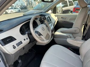 Silver Toyota Sienna with BraunAbility Side Entry Automatic Fold Out conversion