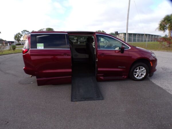 Red Chrysler Voyager with BraunAbility Side Entry Automatic In Floor conversion