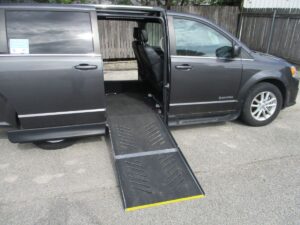 Grey Dodge Grand Caravan with Driverge Side Entry Automatic Fold Out conversion