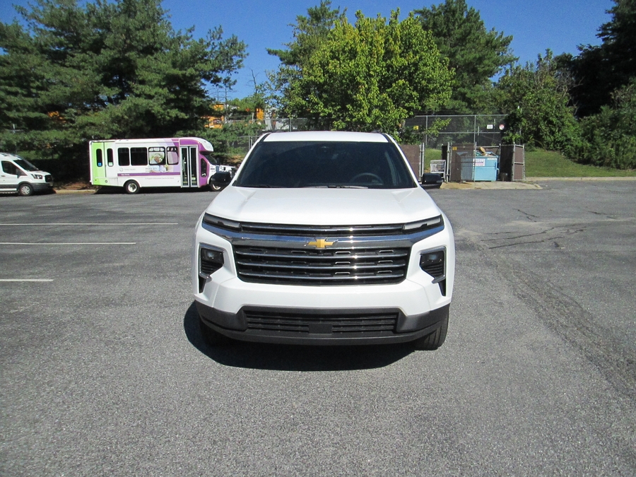 White Chevrolet Traverse with BraunAbility Side Entry Automatic In Floor conversion