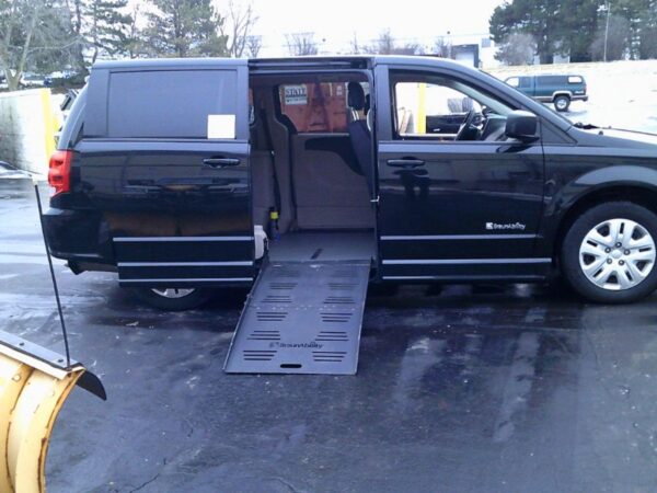 Black Dodge Grand Caravan with BraunAbility Side Entry Automatic Fold Out conversion