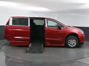 Red Chrysler Pacifica with BraunAbility Side Entry Automatic Fold Out conversion