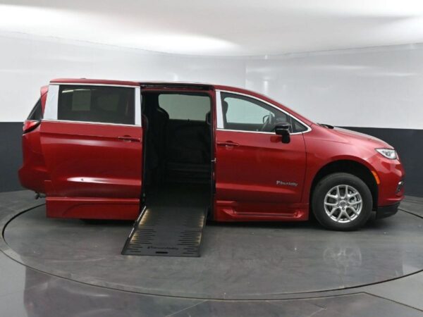 Red Chrysler Pacifica with BraunAbility Side Entry Automatic Fold Out conversion