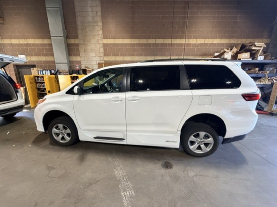 White Toyota Sienna with Vantage Mobility Side Entry Automatic In Floor conversion