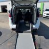 White Chrysler Pacifica with Driverge Rear Entry Manual Fold Out conversion